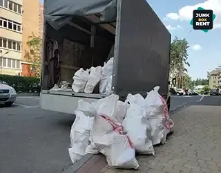 Truck with waste bags.
