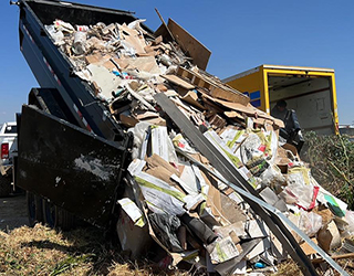 Dumping construction waste.
